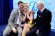 BOSTON, MA - JANUARY 09: Gracie Gold reacts to her scores with coaches Scott Brown and Frank Carroll in the kiss and cry after skating in the short program during the Prudential U.S. Figure Skating Championships at TD Garden on January 9, 2014 in Boston,
