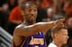 PHOENIX - MAY 6: Kobe Bryant #8 of the Los Angeles Lakers points in game seven of the Western Conference Quarterfinals against the Phoenix Suns during the 2006 NBA Playoffs at US Airways Center on May 6, 2006 in Phoenix, Arizona. The Suns won 121-90 and