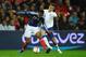 LONDON, ENGLAND - NOVEMBER 17: Yann M'Vila (L) of France holds off the challenge of Jordan Henderson (R) of England during the international friendly match between England and France at Wembley Stadium on November 17, 2010 in London, England. (Photo by