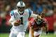 Dec 29, 2013; Atlanta, GA, USA; Carolina Panthers quarterback Cam Newton (1) runs the ball in the first half against the Carolina Panthers at the Georgia Dome. Mandatory Credit: Daniel Shirey-USA TODAY Sports