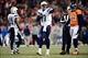 Dec 12, 2013; Denver, CO, USA; Denver Broncos defensive end Shaun Phillips (90) watches as San Diego Chargers quarterback Philip Rivers (17) reacts in the first quarter at Sports Authority Field at Mile High. Mandatory Credit: Ron Chenoy-USA TODAY Sports