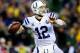 Jan 11, 2014; Foxborough, MA, USA; Indianapolis Colts quarterback Andrew Luck (12) looks to pass during the fourth quarter of the 2013 AFC divisional playoff football game against the New England Patriots at Gillette Stadium. Mandatory Credit: Andrew Webe