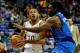 Jan 10, 2014; New Orleans, LA, USA; New Orleans Pelicans shooting guard Eric Gordon (10) drives past Dallas Mavericks small forward Jae Crowder (9) during the first quarter of a game at New Orleans Arena. Mandatory Credit: Derick E. Hingle-USA TODAY Sport