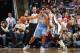 MEMPHIS, TN - DECEMBER 28: Andre Miller #24 of the Denver Nuggets controls the ball against Mike Miller #13 of the Memphis Grizzlies on December 28, 2013 at FedExForum in Memphis, Tennessee. NOTE TO USER: User expressly acknowledges and agrees that, by do