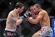Feb 2, 2013; Las Vegas, NV, USA; Frankie Edgar (left) and Jose Aldo (right) battle each other during UFC 156 at the Mandalay Bay Events Center. Mandatory Credit: Gary A. Vasquez-USA TODAY Sports