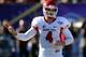 LAS VEGAS, NV - DECEMBER 21: Quarterback Derek Carr #4 of the Fresno State Bulldogs signals teammates during the team's game against the USC Trojans in the Royal Purple Las Vegas Bowl at Sam Boyd Stadium on December 21, 2013 in Las Vegas, Nevada. USC won