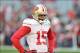 Dec 29, 2013; Phoenix, AZ, USA; San Francisco 49ers wide receiver Michael Crabtree (15) looks on prior to the game against the Arizona Cardinals at University of Phoenix Stadium. Mandatory Credit: Matt Kartozian-USA TODAY Sports