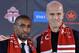 TORONTO, ON - JANUARY 13: Jermain Defoe (L) and Michael Bradley attend a press conference where they were introduced by Toronto FC at Real Sports Bar & Grill on January 13, 2014 in Toronto, Canada. (Photo by Jag Gundu/Getty Images)