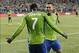 Oct 27, 2013; Seattle, WA, USA; Seattle Sounders forward Clint Dempsey (2) and Seattle Sounders forward Eddie Johnson (7) celebrate after Dempsey scored a goal against the Los Angeles Galaxy during the 1st half at CenturyLink Field. Mandatory Credit: Stev