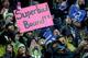 SEATTLE, WA - JANUARY 11: A Seattle Seahawks fan holds up a sign saying 'Superbowl Bound' as the Seahawks take on the New Orleans Saints during the NFC Divisional Playoff Game at CenturyLink Field on January 11, 2014 in Seattle, Washington. (Photo by Ot