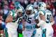 November 4, 2012; Landover, MD, USA; Carolina Panthers defensive end Greg Hardy (76) celebrates with Panthers defensive end Charles Johnson (95) against the Washington Redskins at FedEx Field. Mandatory Credit: Geoff Burke-USA TODAY Sports
