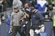 Jan 11, 2014; Seattle, WA, USA; Seattle Seahawks wide receiver Percy Harvin (11) is helped off the field by medical staff members against the New Orleans Saints during the first half of the 2013 NFC divisional playoff football game at CenturyLink Field. M
