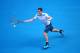 MELBOURNE, AUSTRALIA - JANUARY 14: Andy Murray of Great Britain plays a forehand in his first round match against Go Soeda of Japan during day two of the 2014 Australian Open at Melbourne Park on January 14, 2014 in Melbourne, Australia. (Photo by Quinn