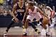 Jan 1, 2014; Toronto, Ontario, CAN; Toronto Raptors point guard Kyle Lowry (7) tries to get the ball past Indiana Pacers point guard George Hill (3) during the fourth quarter of a game at the Air Canada Centre. Toronto won the game 95-82. Mandatory Credi