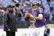 BALTIMORE, MD - DECEMBER 16: New offensive coordinator Jim Caldwell of the Baltimore Ravens looks on as quarterback Joe Flacco #5 warms up before the start of the Ravens game against the Denver Broncos at M&T Bank Stadium on December 16, 2012 in Baltimor