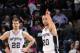 SAN ANTONIO, TX - JANUARY 30: Tiago Splitter #22 and Manu Ginobili #20 of the San Antonio Spurs point down court against the Charlotte Bobcats on January 30, 2013 at the AT&T Center in San Antonio, Texas. NOTE TO USER: User expressly acknowledges and agre