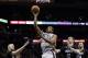 Jan 12, 2014; San Antonio, TX, USA; San Antonio Spurs forward Kawhi Leonard (2) shoots during the first half against the Minnesota Timberwolves at AT&T Center. Mandatory Credit: Soobum Im-USA TODAY Sports