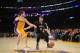 LOS ANGELES, CA - DECEMBER 20: Kevin Love #42 of the Minnesota Timberwolves drives against Pau Gasol #16 of the Los Angeles Lakers at Staples Center on December 20, 2013 in Los Angeles, California. NOTE TO USER: User expressly acknowledges and agrees that