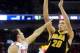 COLUMBUS, OH - JANUARY 12: Jarrod Uthoff #20 of the Iowa Hawkeyes takes a jump shot over Aaron Craft #4 of the Ohio State Buckeyes on January 12, 2014 at Value City Arena in Columbus, Ohio. Ohio State lost by a final score of 84-74. (Photo by Ryan Youn