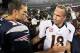 Oct 7, 2012; Foxborough, MA, USA; New England Patriots quarterback Tom Brady (12) shakes hands with Denver Broncos quarterback Peyton Manning (18) following the game at Gillette Stadium. The Patriots defeated the Broncos 31-21. Mandatory Credit: Stew Miln