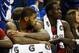 Dec 28, 2013; Lexington, KY, USA; Louisville Cardinals forward Chane Behanan (21) and forward/center Mangok Mathiang (12) look on from the bench during the second half against the Kentucky Wildcats at Rupp Arena. Kentucky defeated Louisville 73-66. Manda