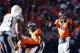 DENVER, CO - JANUARY 12: Peyton Manning #18 of the Denver Broncos calls a play against the San Diego Chargers during the AFC Divisional Playoff Game at Sports Authority Field at Mile High on January 12, 2014 in Denver, Colorado. (Photo by Christian Pete