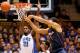 DURHAM, NC - JANUARY 13: Amile Jefferson #21 and Matt Jones #13 of the Duke Blue Devils defend on a drive by Justin Anderson #1 of the Virginia Cavaliers during a game at Cameron Indoor Stadium on January 13, 2014 in Durham, North Carolina. (Photo by Gr