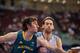 BEIJING - AUGUST 12: Andrew Bogut #6 and Fabricio Oberto #7 of Argentina battle for the rebound during the game against Australia at the 2008 Beijing Summer Olympics on August 12, 2008 at the Beijing Olympic Basketball Gymnasium in Beijing, China. Argen
