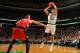 BOSTON, MA - JANUARY 15: Kris Humphries #43 of the Boston Celtics shoots the ball against Jonas Valanciunas #17 of the Toronto Raptors on January 15, 2014 at the TD Garden in Boston, Massachusetts. NOTE TO USER: User expressly acknowledges and agrees tha