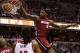 Jan 15, 2014; Washington, DC, USA; Miami Heat small forward LeBron James (6) dunks the ball as Washington Wizards power forward Nene (42) looks on in the third quarter at Verizon Center. The Wizards won 114-97. Mandatory Credit: Geoff Burke-USA TODAY Spor