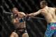 Jan 15, 2014; Duluth, GA, USA; Cole Miller (red gloves) fights Sam Sicilia (blue gloves) during UFC Fight Night at Gwinnett Center. Miller won. Mandatory Credit: Joshua S. Kelly-USA TODAY Sports