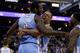 OAKLAND, CA - JANUARY 15: Randy Foye #4 (center) and Nate Robinson #10 congratulate J.J. Hickson #7 of the Denver Nuggets after Hickson stole the ball from Stephen Curry #30 of the Golden State Warriors and then made a lay-up in the final minute of their