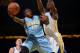OAKLAND, CA - JANUARY 15: Nate Robinson #10 of the Denver Nuggets taking a shot during a game against the Golden State Warriors on January 15, 2014 at the Oracle Aren in Oakland, California. NOTE TO USER: User expressly acknowledges and agrees that, by do