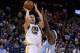 OAKLAND, CA - JANUARY 15: Klay Thompson #11 of the Golden State Warriors shoots over Ty Lawson #3 of the Denver Nuggets at ORACLE Arena on January 15, 2014 in Oakland, California. NOTE TO USER: User expressly acknowledges and agrees that, by downloading