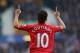 LIVERPOOL, ENGLAND - NOVEMBER 23: Coutinho of Liverpool celebrates scoring the opening goal during the Barclays Premier League match between Everton and Liverpool at Goodison Park on November 23, 2013 in Liverpool, England. (Photo by Alex Livesey/Getty