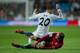 MADRID, SPAIN - JANUARY 09: Jese Rodriguez (L) of Real Madrid CF tackles Francisco Andres Silva (R) of CA Osasuna during the Copa del Rey Round of 8 first match between Real Madrid and CA Osasuna at Estadio Santiago Bernabeu on January 9, 2014 in Madrid,
