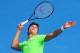 MELBOURNE, AUSTRALIA - JANUARY 07: Milos Raonic of Canada serves during a practice session ahead of the 2014 Australian Open at Melbourne Park on January 7, 2014 in Melbourne, Australia. (Photo by Michael Dodge/Getty Images)