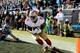 CHARLOTTE, NC - JANUARY 12: Vernon Davis #85 of the San Francisco 49ers catches a touchdown in the second quarter against the Carolina Panthers during the NFC Divisional Playoff Game at Bank of America Stadium on January 12, 2014 in Charlotte, North Caro
