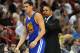 Jan 2, 2014; Miami, FL, USA; Golden State Warriors head coach Mark Jackson (right) talks with shooting guard Klay Thompson (left) during the first half against the Miami Heat at American Airlines Arena. Mandatory Credit: Steve Mitchell-USA TODAY Sports