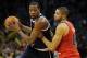 Dec 31, 2013; Oklahoma City, OK, USA; Oklahoma City Thunder small forward Kevin Durant (35) handles the ball while being defended by Portland Trail Blazers small forward Nicolas Batum (88) during the fourth quarter at Chesapeake Energy Arena. Mandatory Cr