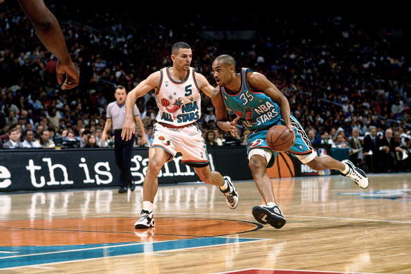 NBA Indonesia - NEW YORK - FEBRUARY 14: Grant Hill #33 of the Eastern  Conference All-Stars attempts a layup against the Western Conference All- Stars during the 1998 NBA All-Star game played February