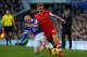 LIVERPOOL, ENGLAND - DECEMBER 29: Luke Shaw of Southampton is tackled by Steven Naismith of Everton during the Barclays Premier League match between Everton and Southampton at Goodison Park on December 29, 2013 in Liverpool, England. (Photo by Paul Thom