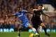 LONDON, ENGLAND - OCTOBER 27: Ashley Cole of Chelsea and Samir Nasri of Manchester City battle for the ball during the Barclays Premier League match between Chelsea and Manchester City at Stamford Bridge on October 27, 2013 in London, England. (Photo by