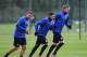 ST ALBANS, ENGLAND - NOVEMBER 25: Lukas Podolski, Mesut Ozil and Per Mertesacker of Arsenal warm up during a training session at London Colney on November 25, 2013 in St Albans, England. (Photo by Shaun Botterill/Getty Images)