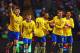 BIRMINGHAM, ENGLAND - JANUARY 13: Olivier Giroud of Arsenal (L) celebrates scoring their second goal with team mates during the Barclays Premier League match between Aston Villa and Arsenal at Villa Park on January 13, 2014 in Birmingham, England. (Phot