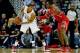 Jan 15, 2014; New Orleans, LA, USA; New Orleans Pelicans power forward Anthony Davis (23) is defended by Houston Rockets power forward Dwight Howard (12) during the second half of a game at the New Orleans Arena. The Rockets defeated the Pelicans 103-100.