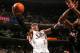 PHILADELPHIA - JANUARY 24: Allen Iverson #3 of the Philadelphia 76ers lays one up against Dwyane Wade #3 of the Miami Heat on January 24, 2005 at the Wachovia Center in Philadelphia, Pennsylvania. NOTE TO USER: User expressly acknowledges and agrees tha