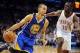 Jan 17, 2014; Oklahoma City, OK, USA; Golden State Warriors point guard Stephen Curry (30) handles the ball against Oklahoma City Thunder point guard Reggie Jackson (15) during the first quarter at Chesapeake Energy Arena. Mandatory Credit: Mark D. Smith-