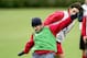 LONDON COLNEY, ENGLAND - DECEMBER 6: Freddie Ljungberg and Robert Pires of Arsenal challenge for the ball during training before the UEFA Champions League Group E match between Arsenal and Rosenborg at London Colney on December 6, 2004 in London Colney,E