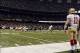 November 25, 2012; New Orleans, LA, USA; San Francisco 49ers quarterback Alex Smith (11) watches from the sidelines during first quarter of their game against the New Orleans Saints at the Mercedes-Benz Superdome. San Francisco 49ers quarterback Colin Ka